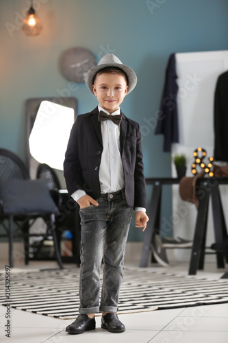 Cute boy in jacket with hat...