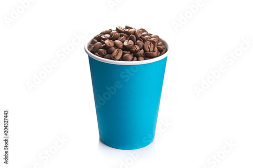 paper cup filled with coffee beans