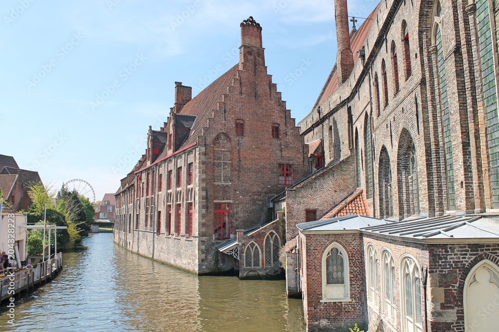 Canal with historic houses in Bruges, Belgium