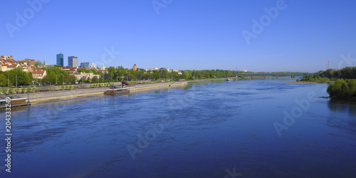Warsaw  Poland - Panoramic view of historic quarter of Warsaw with old town tenements and north districts seen from the Vistula river side