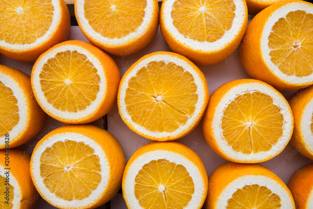 Background of opened oranges for sale at the city farmers market Background of opened oranges for sale at the city farmers market