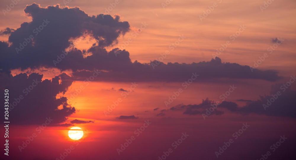 Sky at sunset with clouds