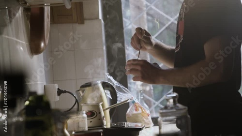 Man Pouring Steaming Fresh Made Coffee In A Coffee Cup 1