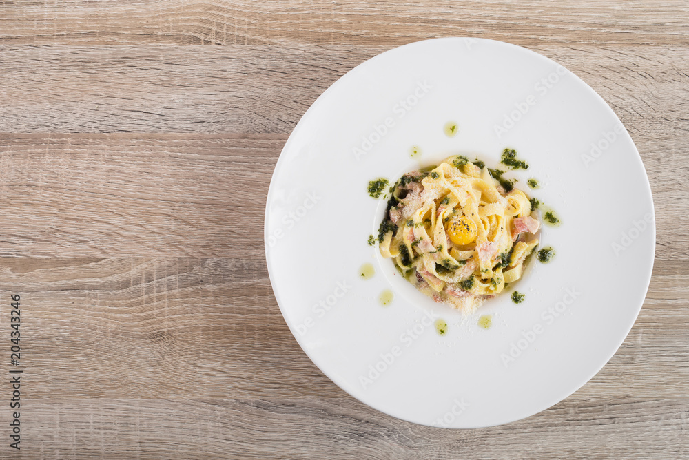 Tasty carbonara paste with raw egg Tasty carbonara paste with raw egg