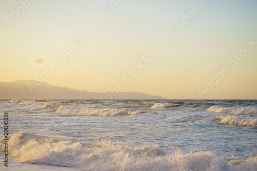 Walk on the beach during a beautiful magical sunset. 