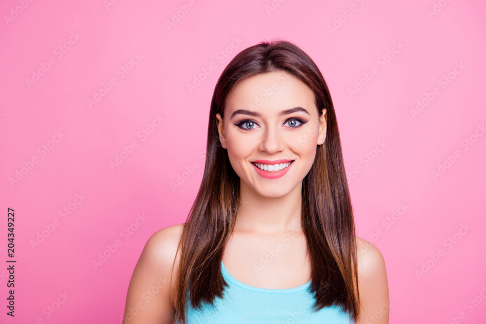 Close up photo of charming wonderful gorgeous pure cute sweet girl with dark brown smooth hair with central parting light coral lipstick eyeliner cat eyes isolated on bright pink background copyspace Close up photo of charming wonderful gorgeous pure cute sweet girl with dark brown smooth hair with central parting light coral lipstick eyeliner cat eyes isolated on bright pink background copyspace