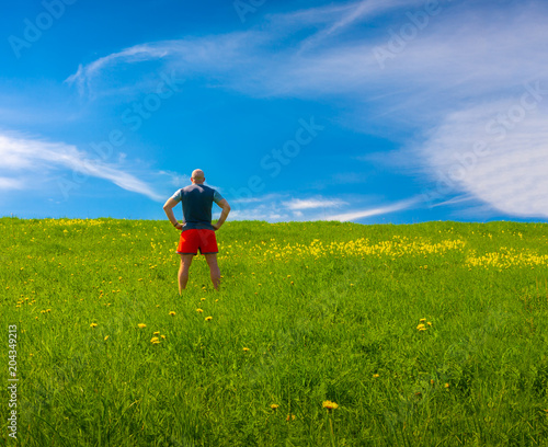 man on the green field