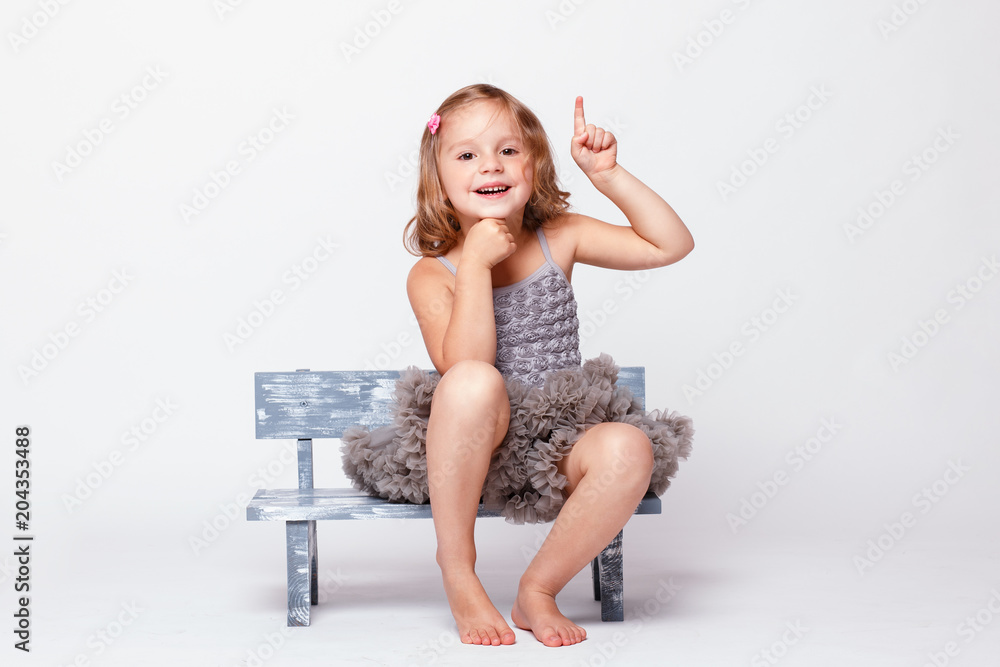 Kid three years old girl pointing the finger Kid three years old girl pointing the finger