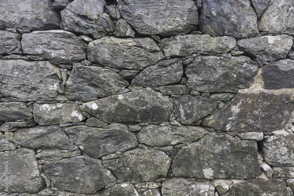 Old rustic stone wall background