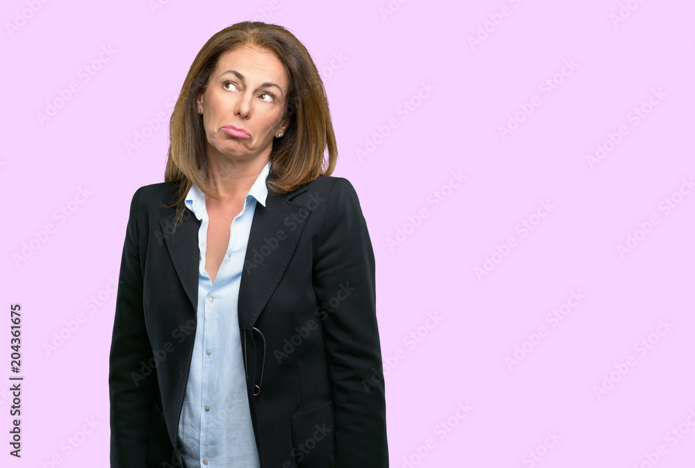 Middle age business woman having skeptical and dissatisfied look expressing Distrust, skepticism and doubt Middle age business woman having skeptical and dissatisfied look expressing Distrust, skepticism and doubt