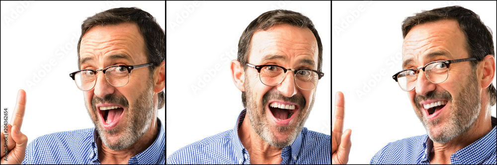 Middle age handsome man closeup pointing away side with finger Middle age handsome man closeup pointing away side with finger