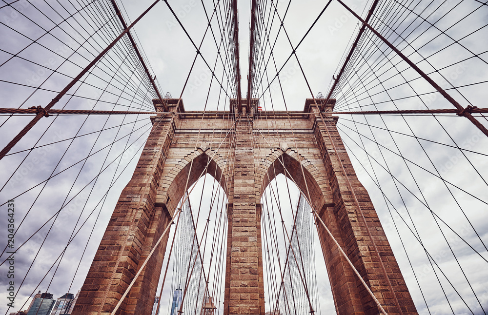 Fototapeta premium Vintage toned picture of the Brooklyn Bridge, New York City, USA.