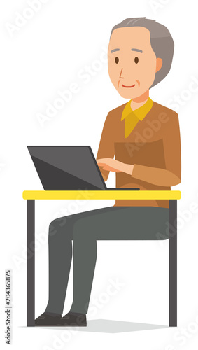 An elderly man wearing brown clothes is operating a laptop computer