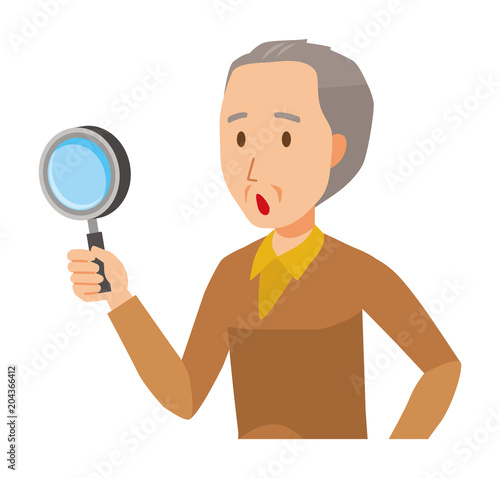 An elderly man wearing brown clothes has a magnifying glass