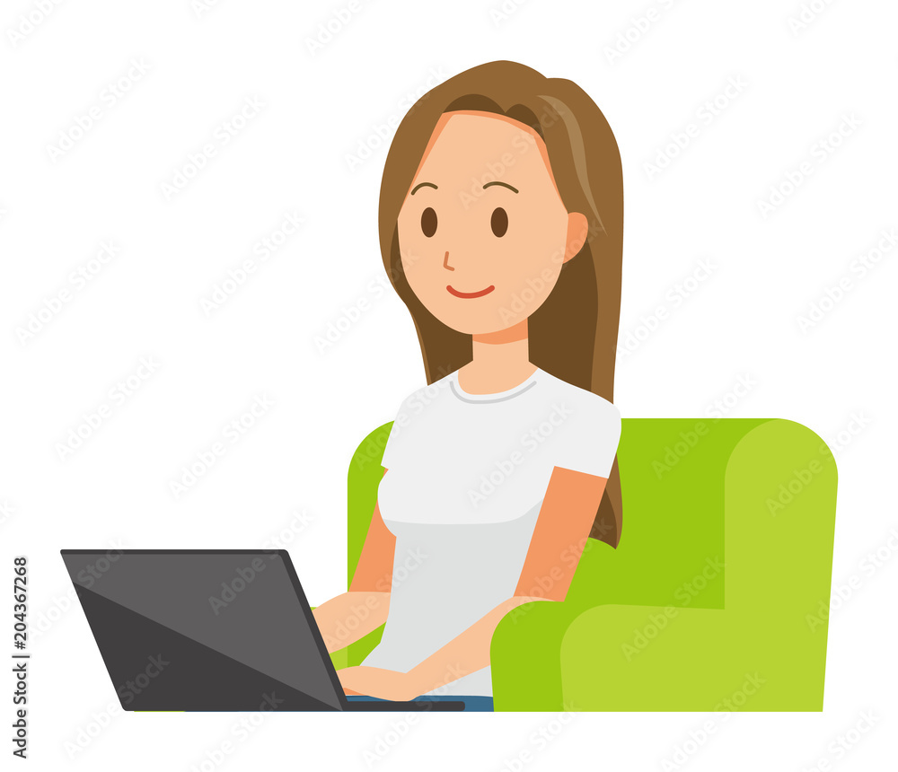 A long hair young woman is sitting on a sofa and operating a laptop computer