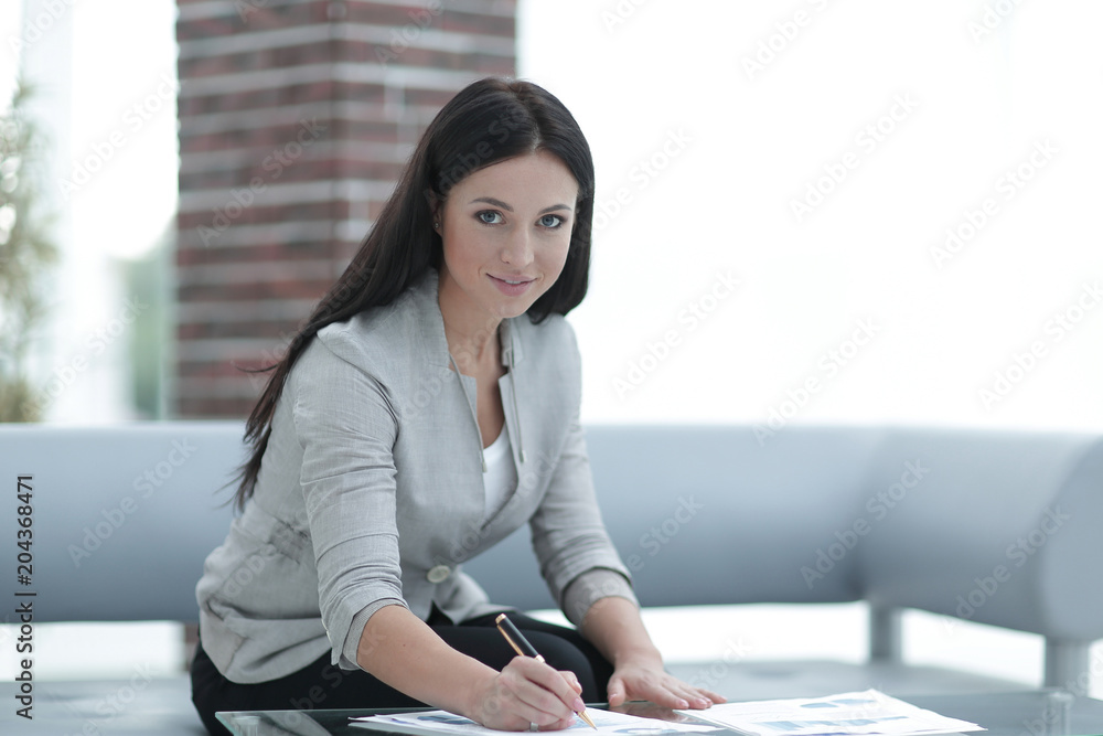 business woman working with documents in the office business woman working with documents in the office