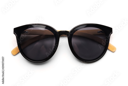Black sunglasses with bamboo frames isolated on a white background