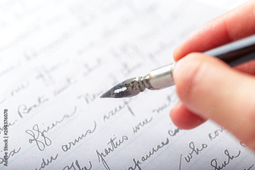 Fountain pen on an antique handwritten letter Fountain pen on an antique handwritten letter