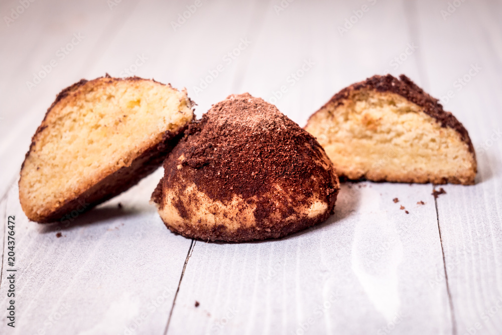 Homemade Cookies with chocolate truffle on white wood with defocused background.