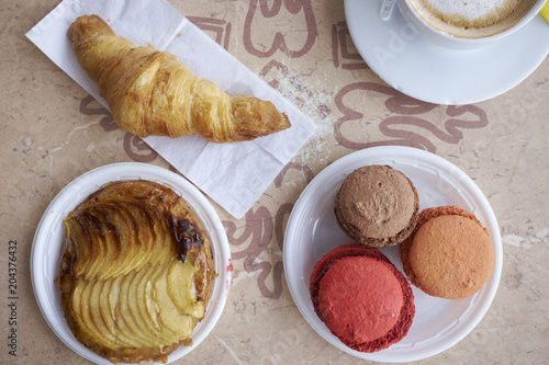 Assorted French pastries on table photo