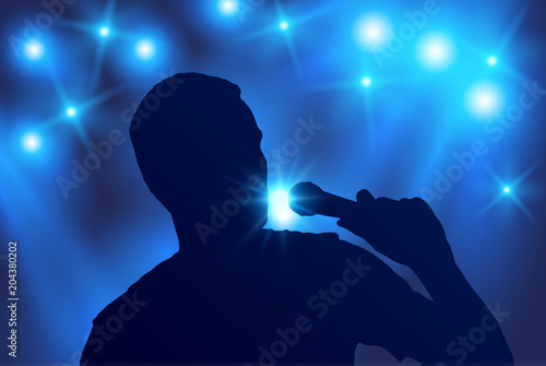 Vector silhouette of male singer singing in microphone with blue spotlights in the background