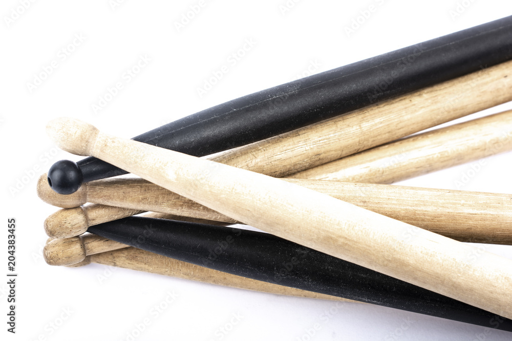 many drum sticks of two colors isolate