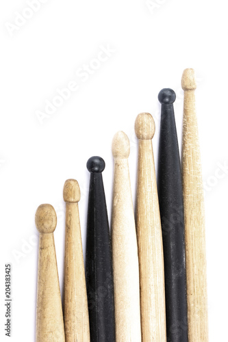 many drum sticks of two colors isolate