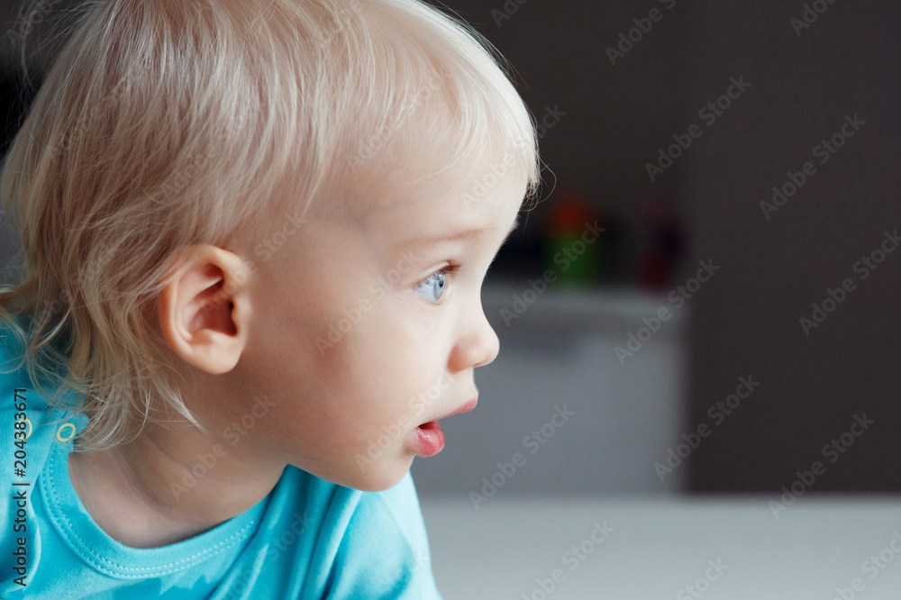 Cute boy with blond hair and blue eyes Cute boy with blond hair and blue eyes