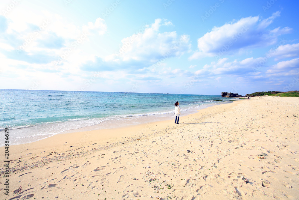 woman vacation alone in okinawa beach
