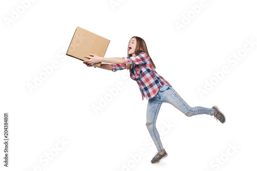 Delivery concept. Full length excited woman running hurrying carrying cardboard box, isolated on white background