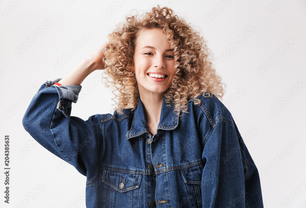 Portrait of a smiling young girl in denim jacket Portrait of a smiling young girl in denim jacket