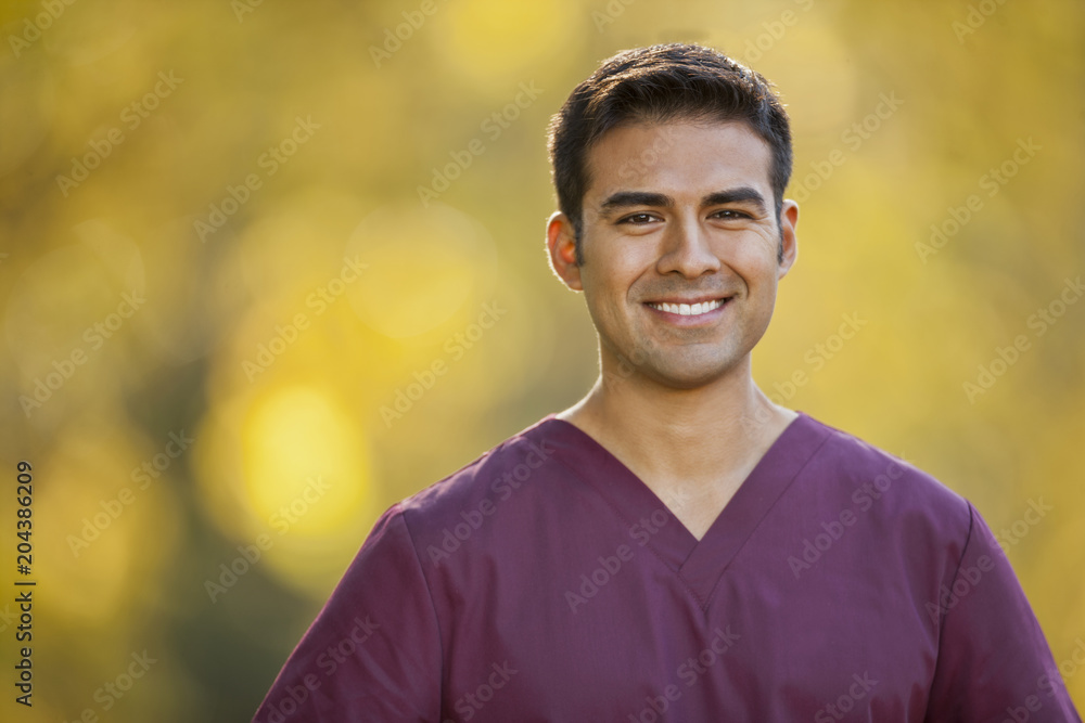 Portrait of a smiling male nurse. Portrait of a smiling male nurse.