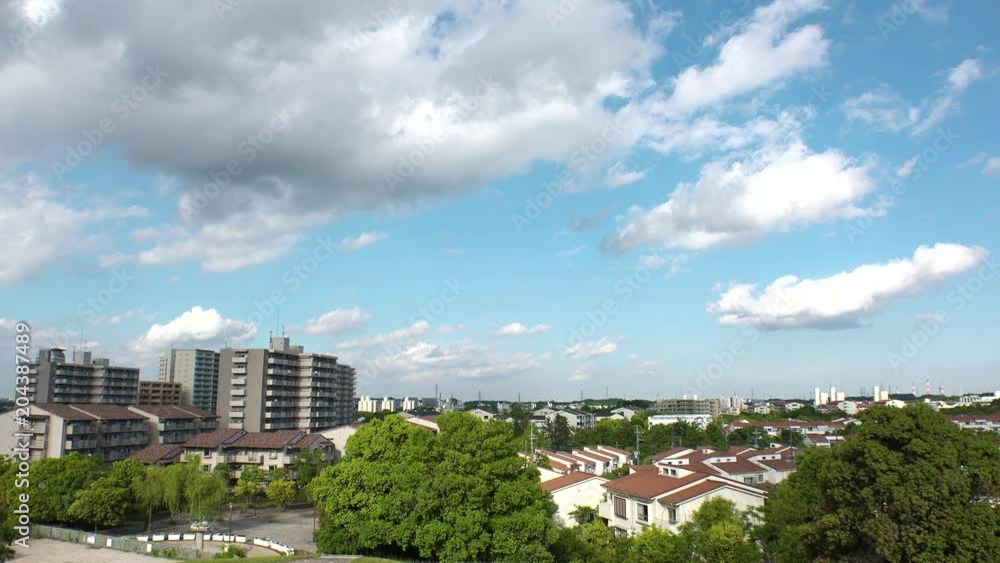 TAMA CITY, TOKYO, JAPAN - CIRCA MAY 2018 : Scenery of TAMA NEW TOWN RESIDENTIAL AREA from TSRUMAKI HIGASHI PARK near TAMA CENTER train station. TAMA CITY, TOKYO, JAPAN - CIRCA MAY 2018 : Scenery of TAMA NEW TOWN RESIDENTIAL AREA from TSRUMAKI HIGASHI PARK near TAMA CENTER train station.