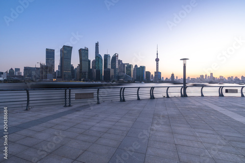 panoramic city skyline with empty floor