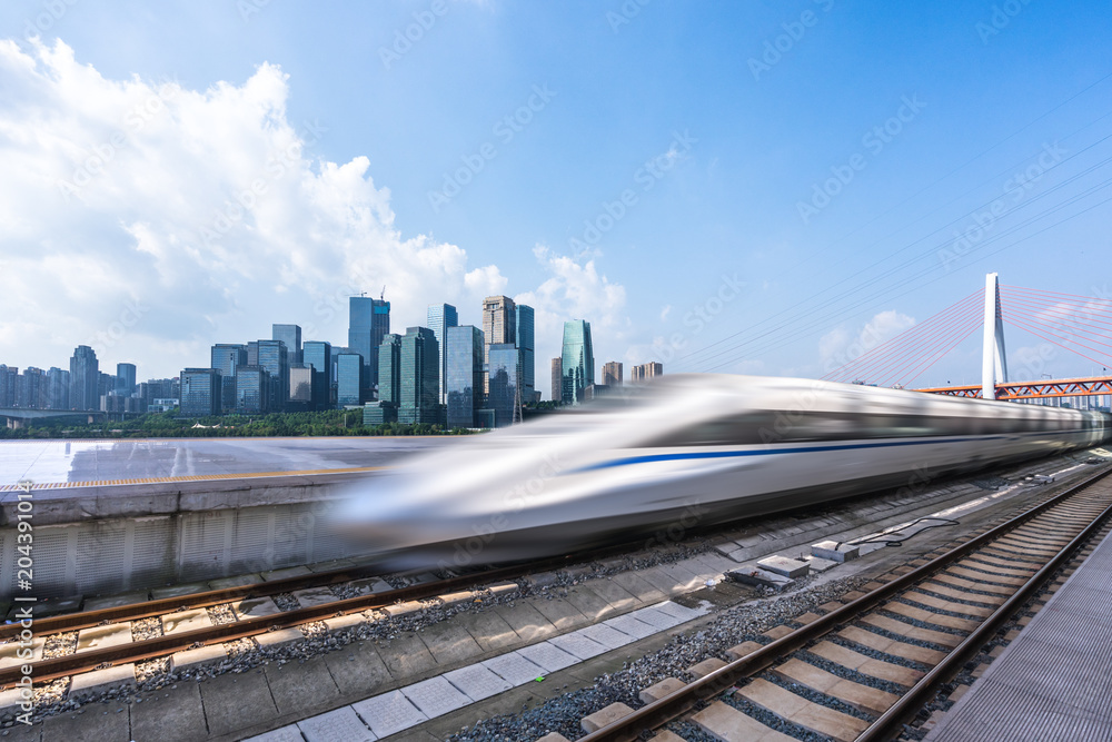 high speed train with city skyline