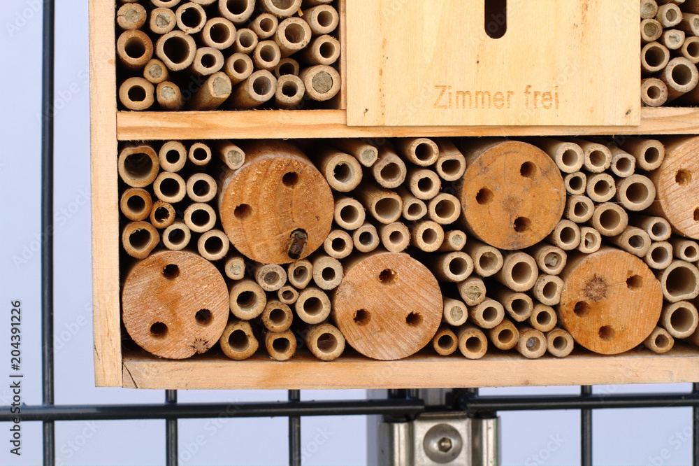 insect hotel made of wood nad bamboo sticks. insect hotel made of wood nad bamboo sticks.