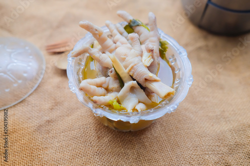Chicken feet with picy soup on bowl