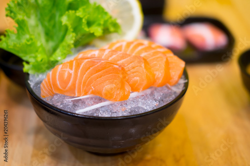 Raw salmon slice or salmon sashimi