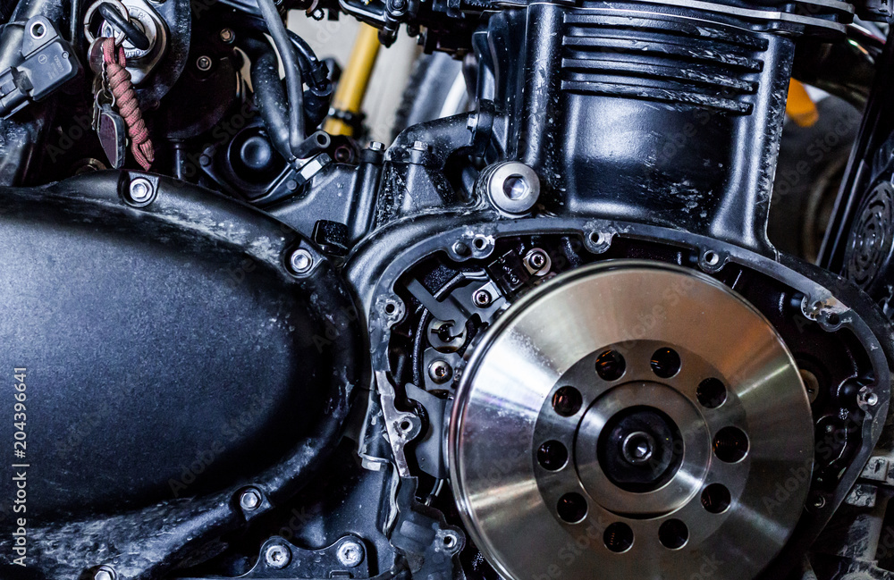 motorcycle service clutch disc repair close up soft light conditions motorcycle service clutch disc repair close up soft light conditions