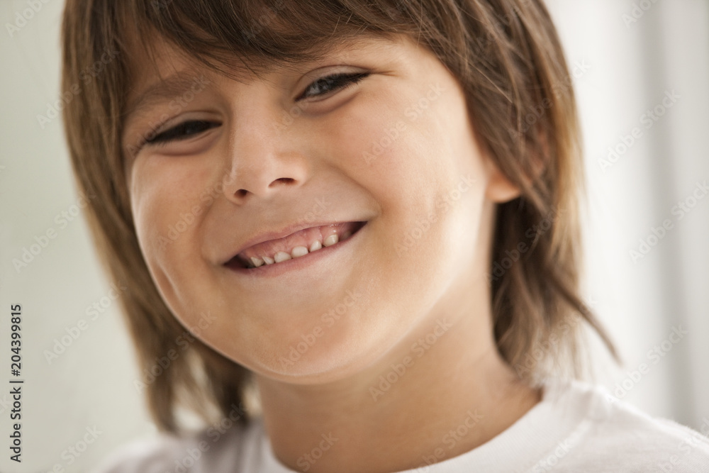 Portrait of smiling young boy. Portrait of smiling young boy.