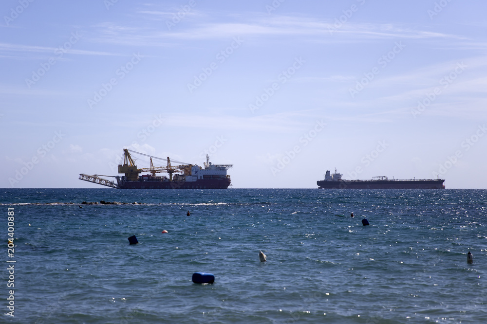 Cargo ships on the horizon