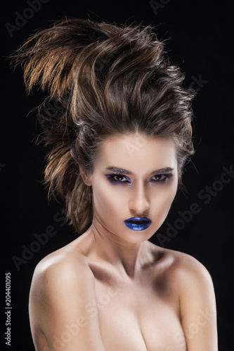 Portrait of a beautiful big breast asian naked shoulders, vanguard conceptual hairstyle and aggressive blue lips makeup girl