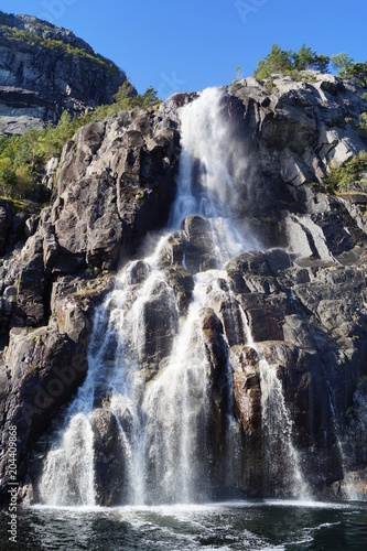 Norwegian waterfall on the fjords