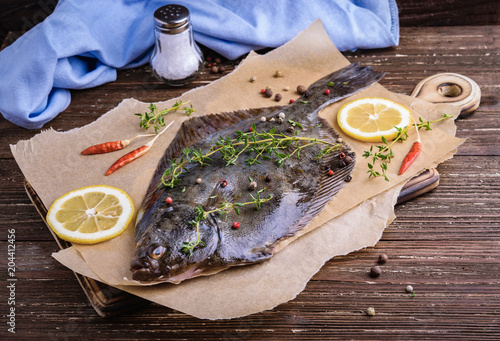 Canvas-taulu Cooking flounder fish