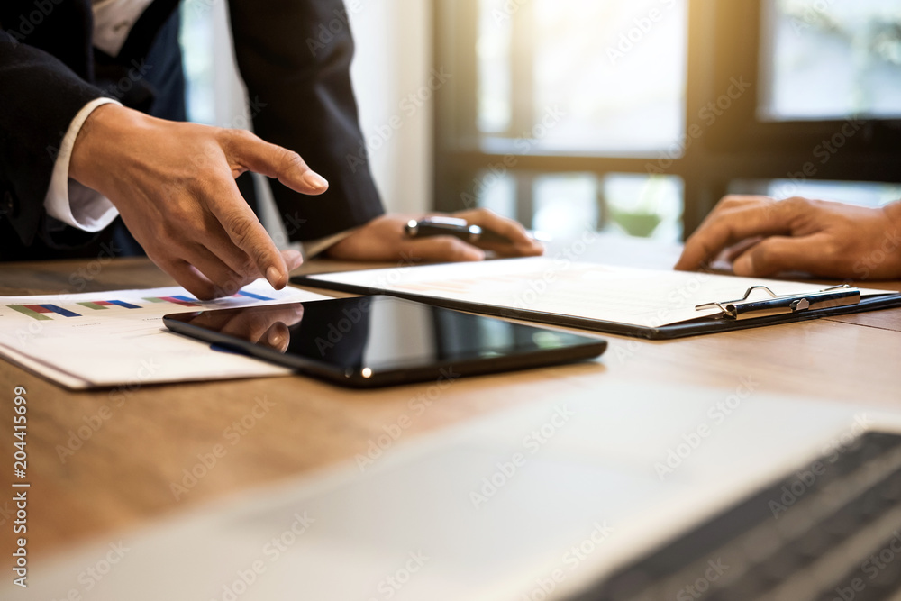 Professional business woman working, Doing finance on digital tablet, document graph and analysis business strategy to development profit Professional business woman working, Doing finance on digital tablet, document graph and analysis business strategy to development profit