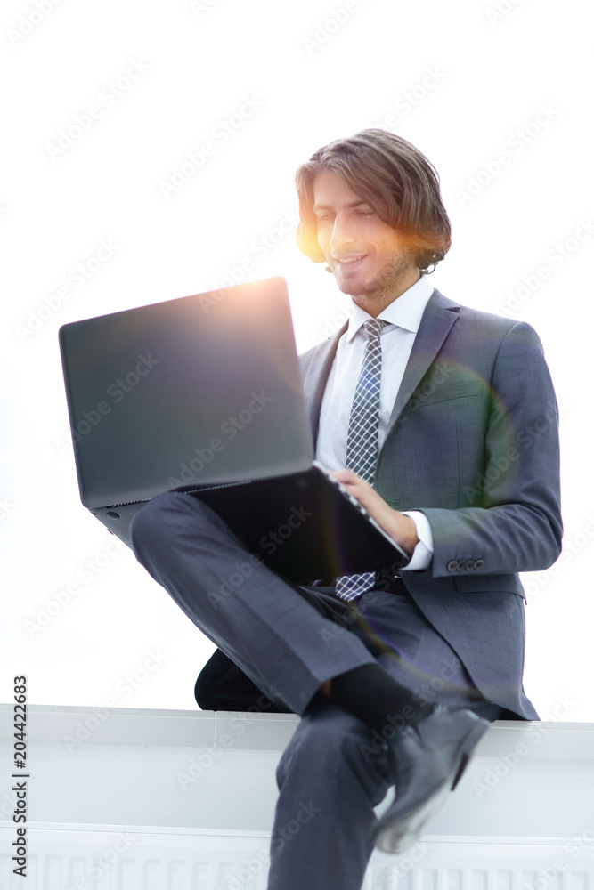 closeup.successful businessman working on a laptop closeup.successful businessman working on a laptop