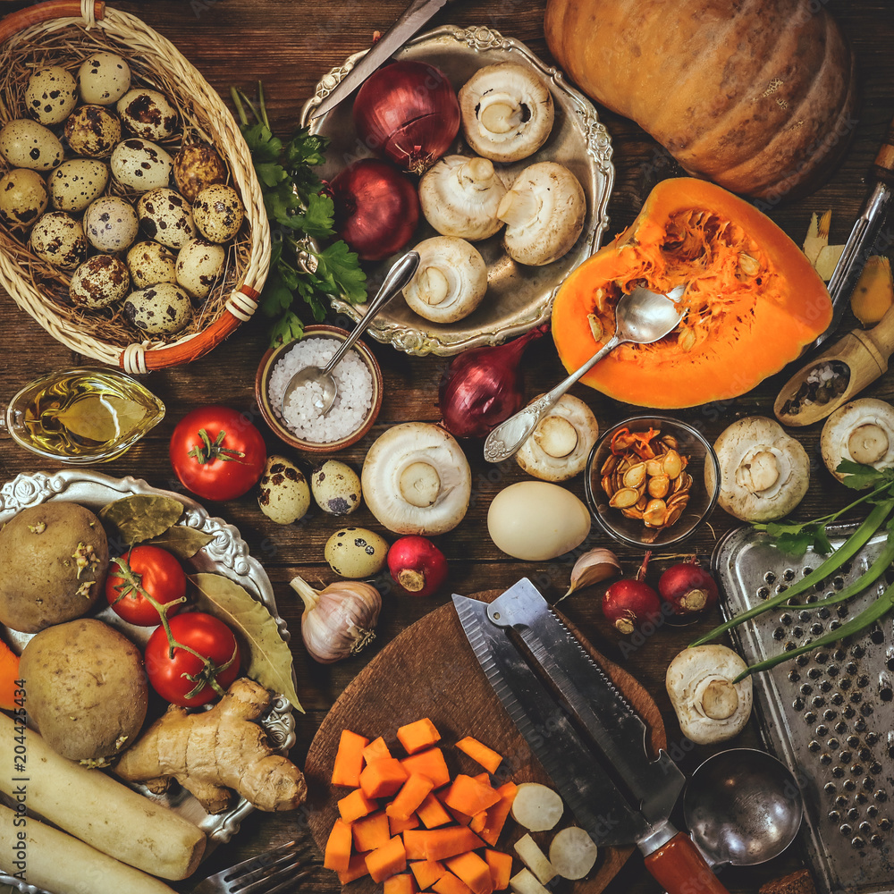 cooking dishes from pumpkin and mushrooms champignons. spices and ingredients. vintage kitchen appliances. healthy food. wooden background. cooking dishes from pumpkin and mushrooms champignons. spices and ingredients. vintage kitchen appliances. healthy food. wooden background.