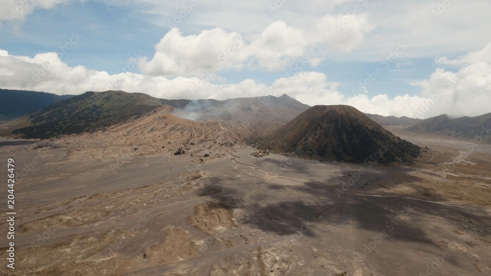 Mountain Bromo active volcano crater in East Jawa, Indonesia. Aerial view of volcano crater Mount Gunung Bromo is an active volcano,Tengger Semeru National Park.
