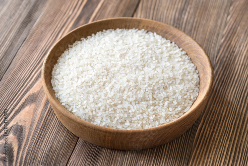 Bowl of uncooked camolino rice