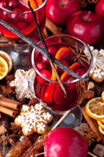 Mulled wine with slice of orange and spices